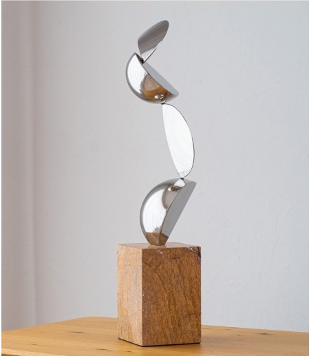 Escultura Movimiento acero y mármol - VP Interiorismo
