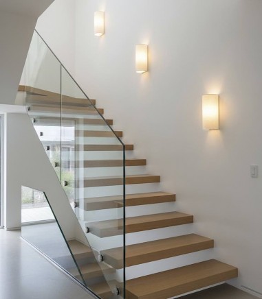 Apliques LUMA de ACB Iluminación instalados en unas escaleras